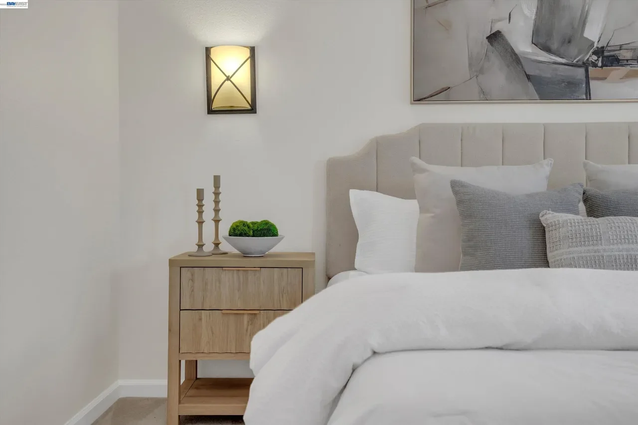 A closer bedroom view highlights the neutral finishes and recessed lighting at 19475 Mount Jasper Drive.